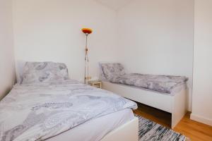 Postel nebo postele na pokoji v ubytování B&B Vransko 29