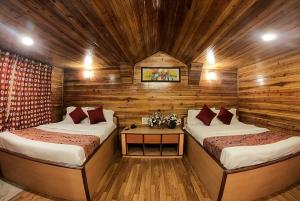 Легло или легла в стая в Goroomgo Broadway Mall Road Darjeeling - Best Hotel in Darjeeling