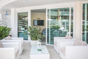 TV a/nebo společenská místnost v ubytování Hotel Vittoria
