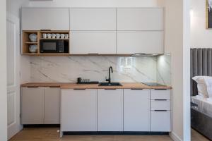 Η κουζίνα ή μικρή κουζίνα στο Piano Nobile Residence +6 φωτογραφίες
