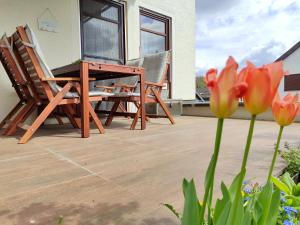 Balkoni atau teres di BohèmeNest Terminal Apartments - Chic & gemütlich mit Terrasse