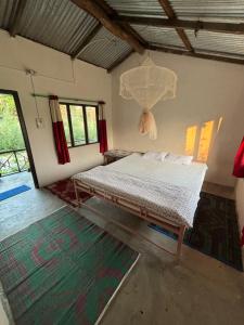 Postel nebo postele na pokoji v ubytování Nanu's Bardiya Homestay