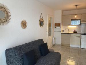 Kuchyň nebo kuchyňský kout v ubytování La belle étape proche centre ville et grande plage