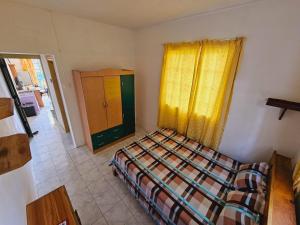 Postel nebo postele na pokoji v ubytování Tropical Apartment