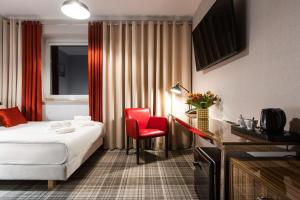 Łóżko lub łóżka w pokoju w obiekcie Hotel Iskierka Business & Spa