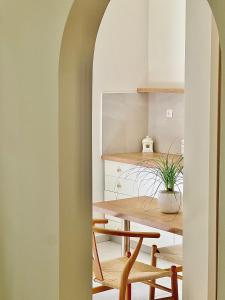 a dining room with a table and chairs at Parakladi unique stay in Agios Nikolaos +16 photos