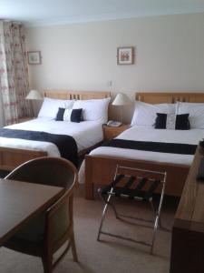 Voodi või voodid majutusasutuse Percy French Hotel toas