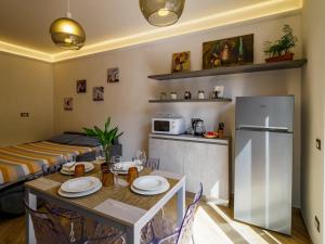Kuchyň nebo kuchyňský kout v ubytování Macaia Apartment with AC + 19 fotografií