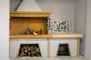 a model of a kitchen with a fireplace at Vista Magica in Pastida