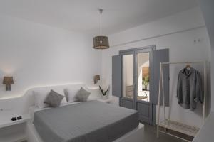 Postel nebo postele na pokoji v ubytování The Vine Suites