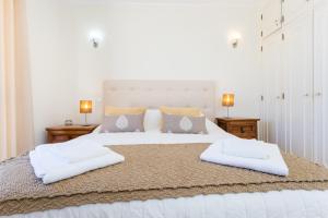 Ένα ή περισσότερα κρεβάτια σε δωμάτιο στο Villa Waterside