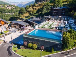 an aerial view of a resort with a swimming pool at Aparthotel AnyosPark Mountain & Wellness Resort in Anyós