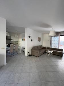 Χώρος καθιστικού στο Ferienhaus Residenz Capo Nord Aprilia Marittima bei Lignano , Via Capo Nord 5 Haus 42