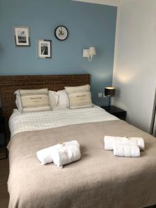 Postel nebo postele na pokoji v ubytování Hotel Les Embruns