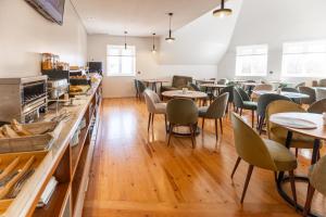 A cozinha ou cozinha compacta de Avenida Boutique Hotel