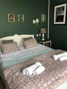 Postel nebo postele na pokoji v ubytování Hotel Les Embruns