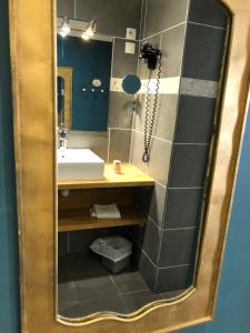 Koupelna v ubytování Hotel Les Embruns