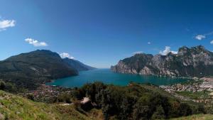 a view of a lake between two mountains at Tenno Lake Sun in Tenno