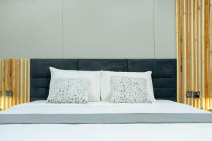 Letto o letti in una camera di Kashco Apartments Wuse 2 Abuja
