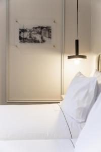 Cama ou camas em um quarto em Avenida Boutique Hotel