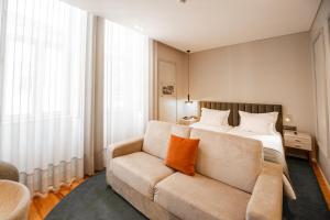 Cama ou camas em um quarto em Avenida Boutique Hotel