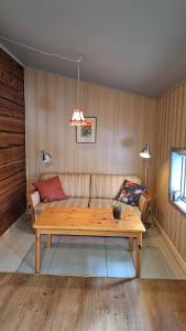 Posezení v ubytování Hammarstrand B&B och lägenhet