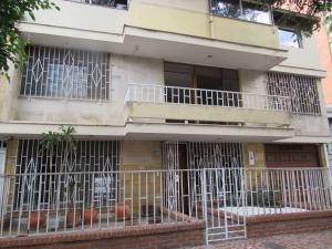 a building with bars on the side of it at APARTAHOTEL ESTADIO GOLD in Medellín