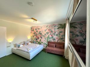 Postel nebo postele na pokoji v ubytování WannerHus Hotel