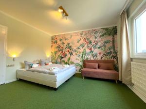Postel nebo postele na pokoji v ubytování WannerHus Hotel