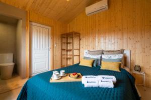 a bedroom with a bed with a tray of food on it at Host Wise - Spacious Comfortable House Pool in Amarante
