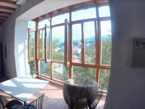 a large window with a view of a mountain at 6 bedrooms house with furnished garden and wifi at Otanes 4 km away from the beach in Otañes