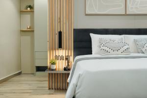 Letto o letti in una camera di Kashco Apartments Wuse 2 Abuja