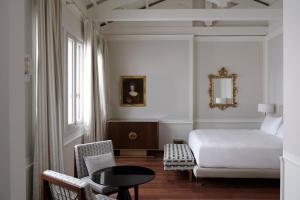 Postel nebo postele na pokoji v ubytování Violino d'Oro Venezia