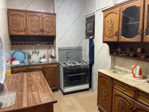 Kuchyň nebo kuchyňský kout v ubytování Elnoras city ismailia + 8 fotografií