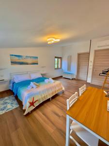 Katil atau katil-katil dalam bilik di Casa del Mare Guest house
