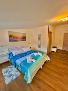 Casa del Mare Guest house tesisinde bir odada yatak veya yataklar