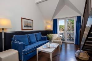 Posezení v ubytování Precise Resort Hafendorf Rheinsberg