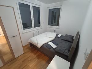 Postel nebo postele na pokoji v ubytování Uros 7
