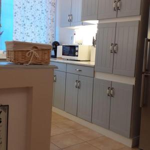 Kuchyň nebo kuchyňský kout v ubytování Lux Apartman Villa