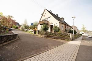 a house on the side of a street at Domäne Bollinger Morbach in Morbach