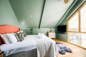 Ένα ή περισσότερα κρεβάτια σε δωμάτιο στο Grayling House HM28 Lower Mill The Cotswolds