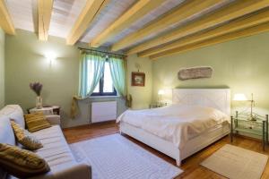 Ferienhaus in Aquileia mit Großem Garten 객실 침대