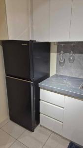 Gallery image of Muji Style Condo with Parking in Manila