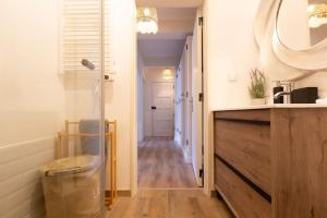 a bathroom with a sink and a mirror at beachome4u4 / Carcavelos beach in Parede +36 photos
