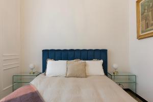 Postelja oz. postelje v sobi nastanitve Casa Magnolia appartamento in Stazzano