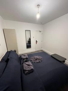 Postel nebo postele na pokoji v ubytování Oxford street minutes away