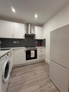 Kuchyň nebo kuchyňský kout v ubytování London Eye and Big Ben nearby