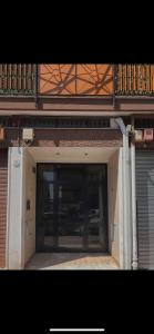 a garage door is open on a building at Dimora: A casa di Pier in Bari