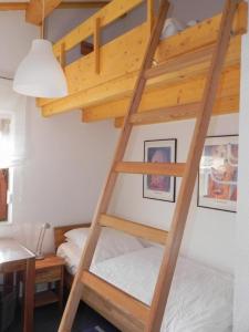 Postel nebo postele na pokoji v ubytování E19 Haus mit Wintergarten, Terrasse und Garten