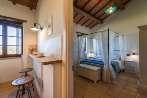 Agriturismo - La Campagna di San Francesco客房内的一张或多张床位